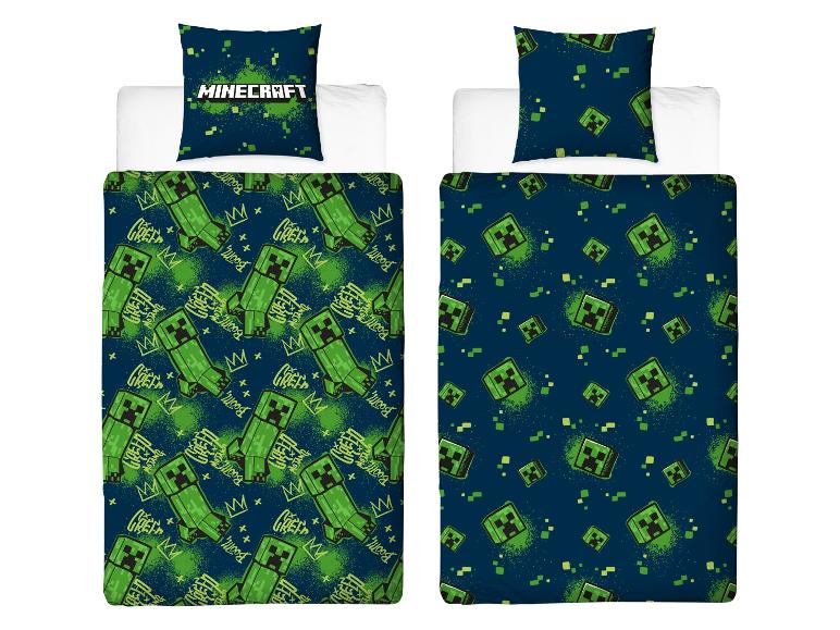 Parure de lit Minecraft : Creeper et motifs pixelisés sur fond bleu foncé.