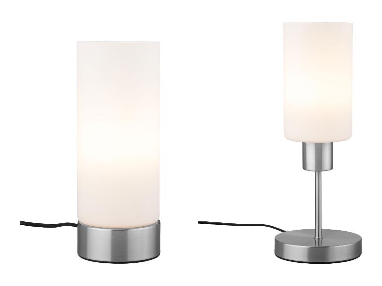 Deux lampes de table modernes avec abat-jour cylindriques en verre dépoli et bases métalliques.