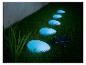 Pierres lumineuses solaires bleues pour jardin.