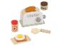 Grille-pain jouet en bois avec toast, confiture, pâte à tartiner, beurre et œuf sur une planche à découper.