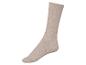 Chaussette en laine beige pour femme.