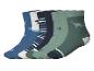 Lot de 6 paires de chaussettes enfant à motifs dinosaures dans les tons bleus et verts.