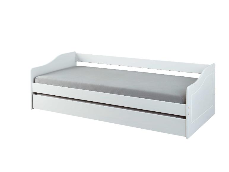 Canapé-lit blanc avec tiroir.