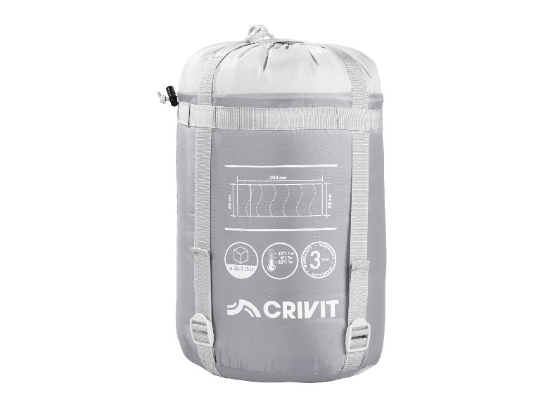 Sac de couchage gris dans un sac de compression avec dimensions et températures.