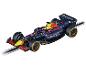 Voiture de course jouet Carrera Super Formula Red Bull sur la piste.