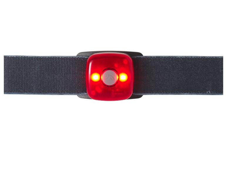 Lampe de sécurité LED rouge avec sangle noire, allumée.