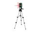 Un niveau laser vert avec une croix rouge sur un trépied.