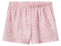 Short rose pour enfant avec motif floral et cœurs.