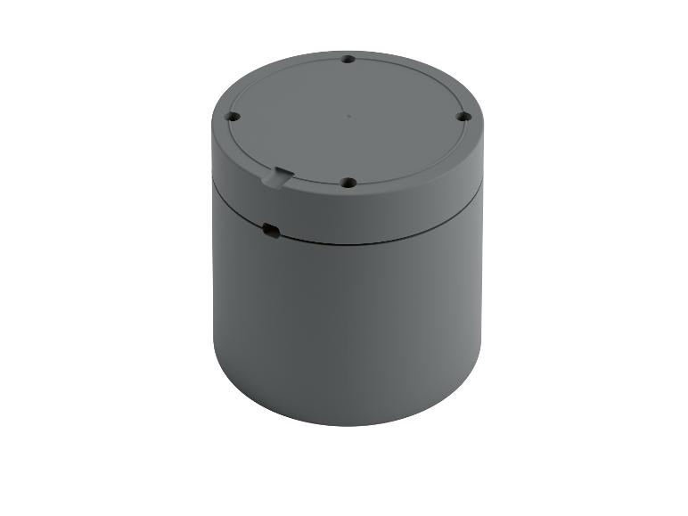 Boîtier cylindrique gris foncé pour appareils électroniques.