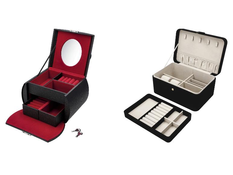 Deux boîtes à bijoux noires, l'une avec intérieur rouge et miroir, l'autre avec intérieur beige et plateau amovible.