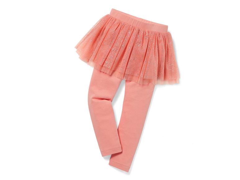 Leggings roses avec une jupe en tulle pailletée.
