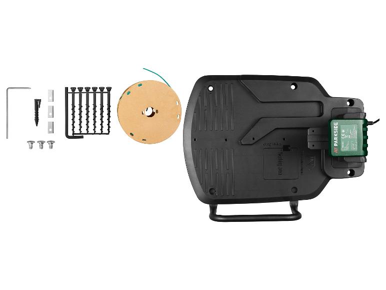 Accessoires pour tondeuse robot, incluant câble périphérique, piquets et chargeur.
