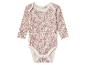 Bodysuit bébé à manches longues, imprimé floral rose et blanc.