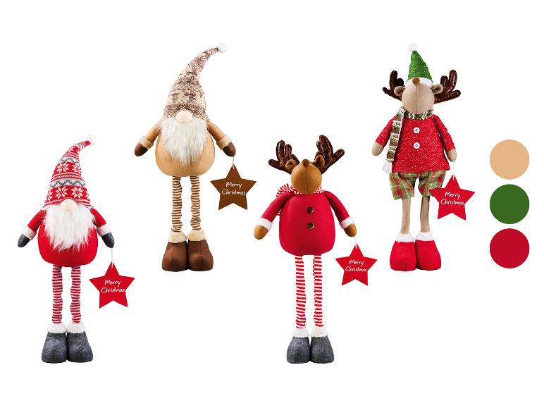 Figurines de Noël en peluche : deux gnomes et deux rennes, chacun avec une étiquette 'Merry Christmas'.