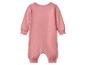 Grenouillère bébé rose unie à manches longues et col rond.