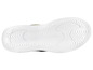 Semelle de basket blanche avec un motif ondulé.