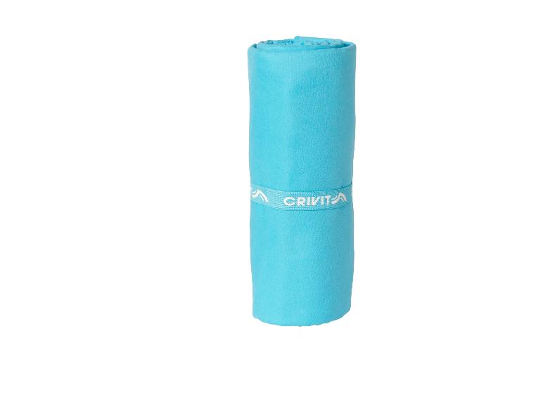 Serviette de sport Crivit bleu turquoise, roulée.
