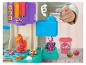Machine à crème glacée Play-Doh avec pâte à modeler colorée et accessoires de dessert.