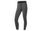 Leggings grises foncées avec cordon de serrage et poches latérales.