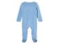 Une grenouillère bleu clair pour bébé en velours doux.