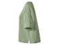 Haut vert clair à manches courtes en tissu texturé, vue latérale.