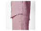 Ensemble pantalon et chemise assorti rose poudré.