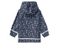 Imperméable bleu avec un imprimé marin de bateaux et de coquillages
