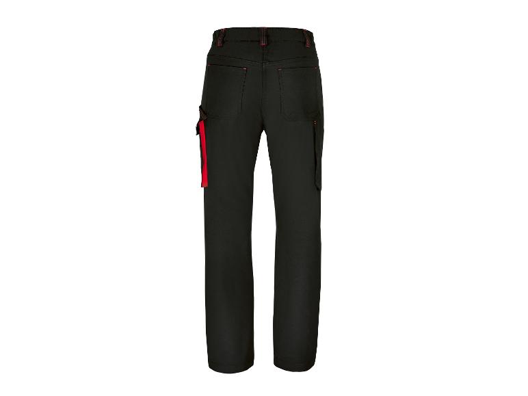 Pantalon noir avec détails rouges.