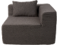 Canapé modulaire gris foncé avec un accoudoir unique et un coussin de dossier.
