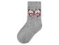 Chaussette enfant grise avec motif papillon rose.