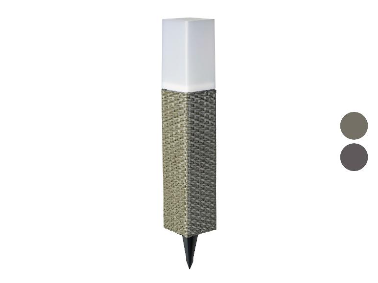 Lampe solaire LED avec boîtier tressé gris et beige, avec piquet de terre.