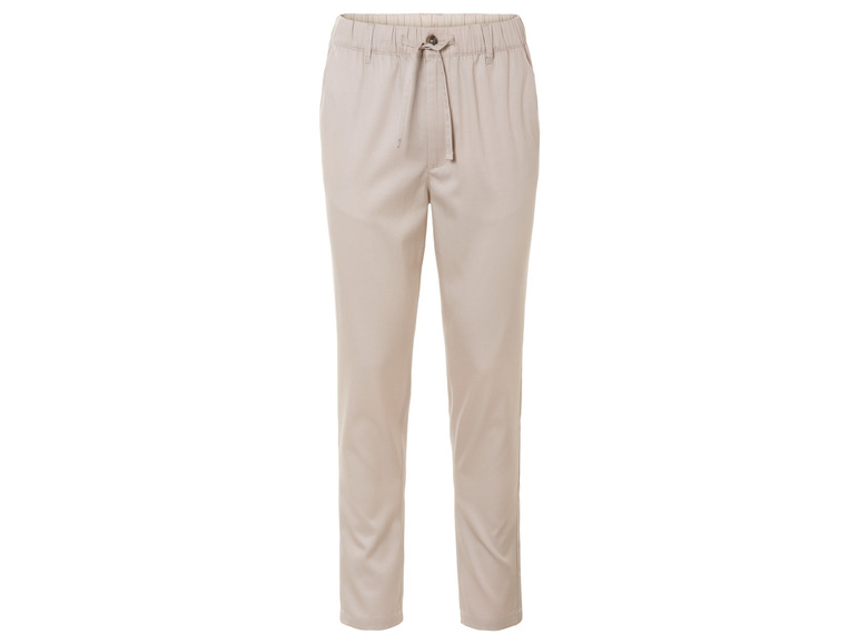 Pantalon beige avec cordon de serrage.