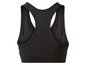 Un soutien-gorge de sport noir pour femme.