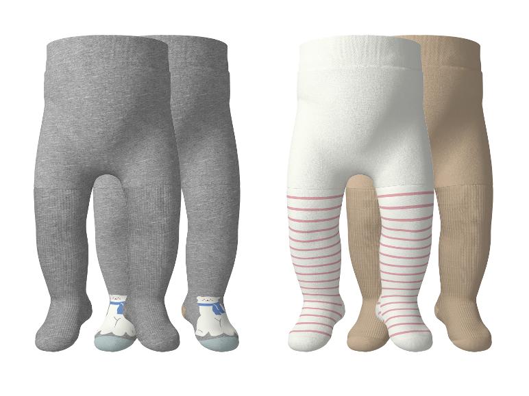Lot de collants bébé : gris avec ours polaire, blancs rayés et beiges.