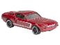 Une voiture jouet Hot Wheels Ford Mustang GT500 rouge.