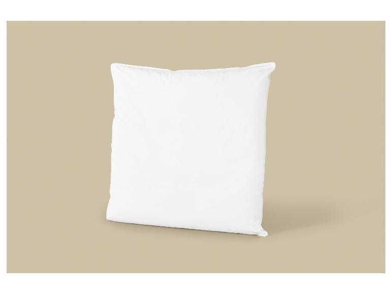 Sac blanc de farine ou de sucre sur fond beige