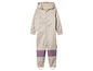 Combinaison de pluie beige à motif de feuilles pour enfants.