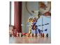 Un dragon LEGO Ninjago doré et violet avec des figurines sur une table en bois.