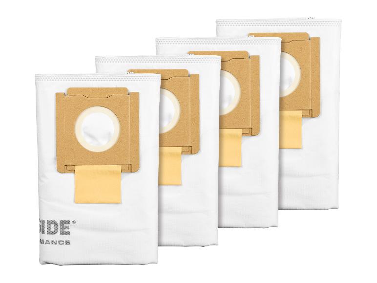 Quatre sacs d'aspirateur blancs de la marque 'Vaxide'.