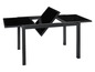 Une table à manger en verre noir avec un plateau extensible de Livarno.