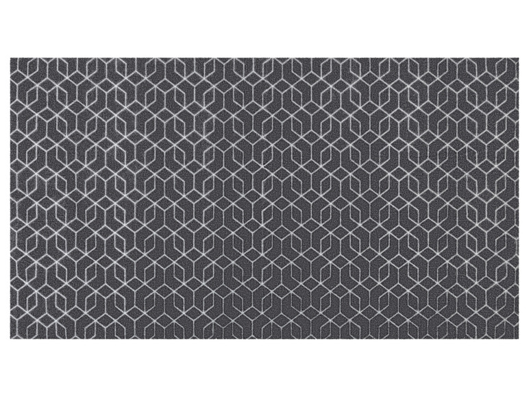 Un paillasson gris foncé avec un motif géométrique blanc.
