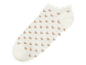 Chaussette blanche à motifs cœurs beiges.