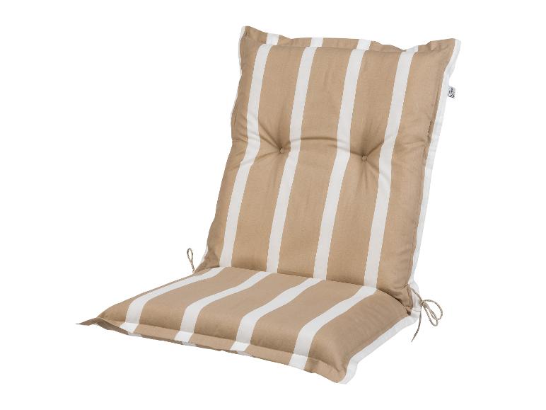 Un coussin de siège de chaise à rayures beiges et blanches