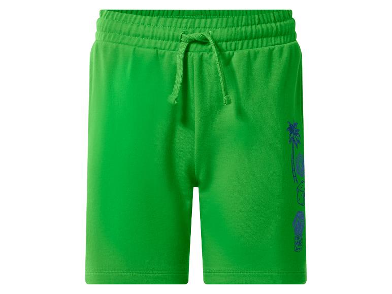Short vert avec taille élastique, cordon de serrage et motif palmier bleu.