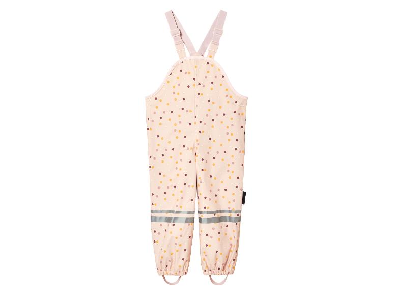 Salopette imperméable enfant à pois.