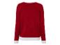 Un pull rouge avec des bordures blanches.