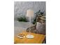 Lampe de table blanche moderne sur une table en bois.