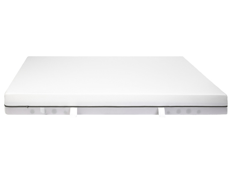 Matelas blanc avec une fermeture éclair grise