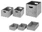 Boîtes et paniers de rangement en feutre gris de différentes tailles pour l'organisation de la maison.