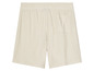 Short beige avec cordon et une poche.
